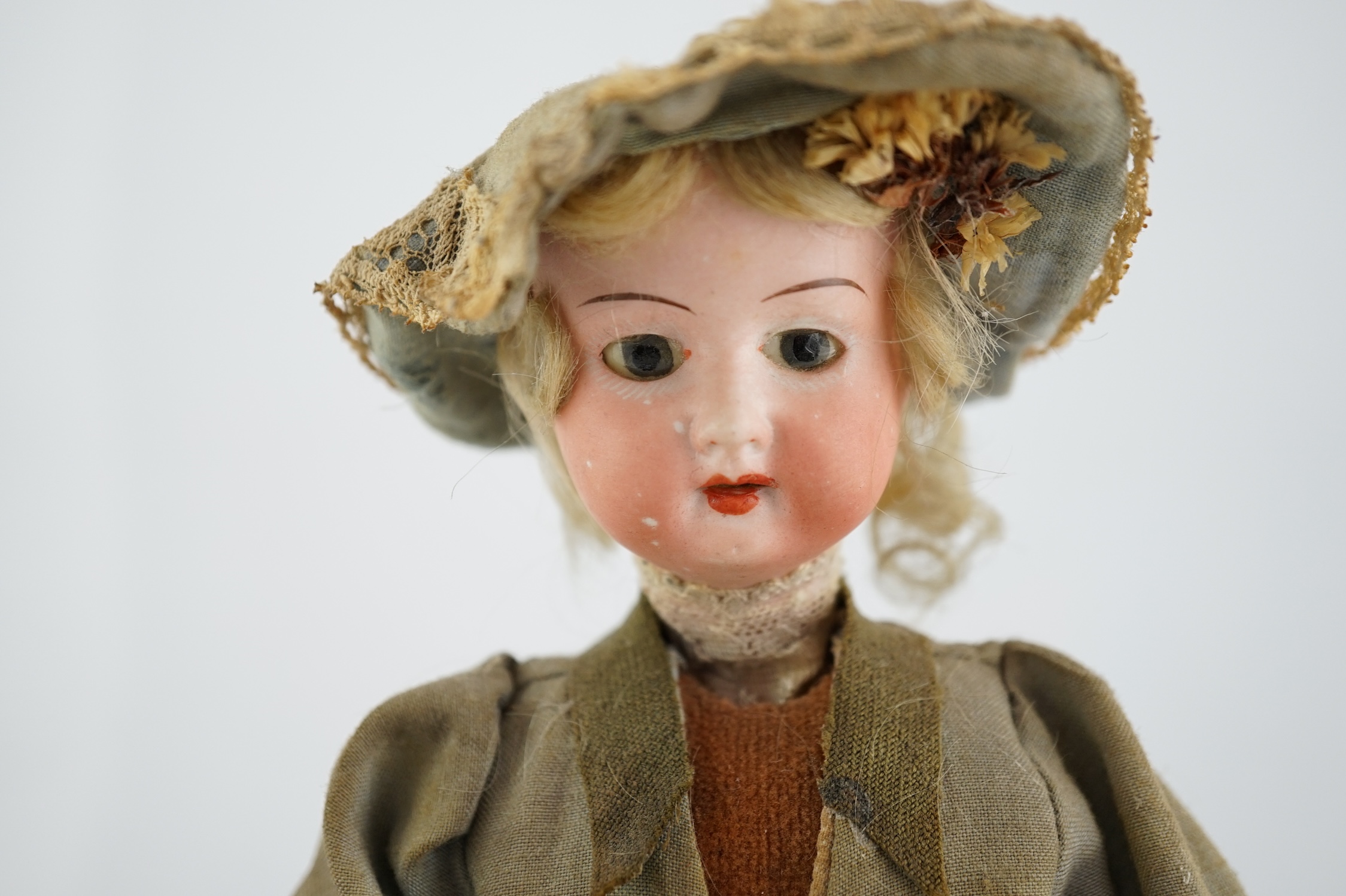 A German automaton of a flower seller, 39cm high